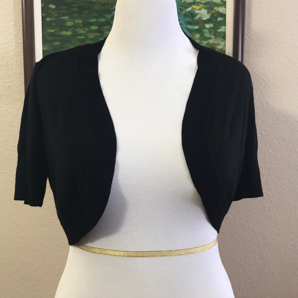 NWT black short sleeve shrug with lace on back